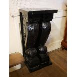 A PAIR OF REGENCY STYLE EBONISED COLUMNS With acanthus leaf supports. (84cm)
