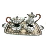 A LATE 19TH CENTURY 'ROGERS OF CANADA' FOUR PIECE SILVER PLATED TEA AND COFFEE SERVICE ON A SILVER