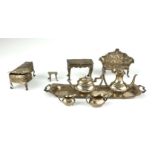 A 20TH CENTURY SILVER NOVELTY MINIATURE TEA SERVICE Comprising a twin handle tray, coffee pot,