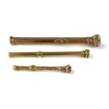 A VICTORIAN 9CT GOLD AND HARDSTONE PROPELLING PENCIL Having fine engraved decoration, together