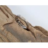 A VINTAGE 18CT WHITE GOLD AND DIAMOND RING Set with sixteen diamonds and having etched decoration to