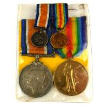 A PAIR OF WWI BRITISH WAR MEDALS AND MINIATURES Silver War Medal and bronze Great War for