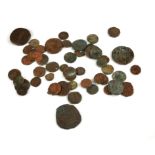 A MIXED COLLECTION OF ROMAN BRONZE COINS Various designs and denominations.