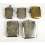 A COLLECTION OF FIVE EARLY 20TH CENTURY SILVER RECTANGULAR VESTA CASES With engraved decoration,