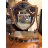 AN EDWARDIAN MAHOGANY INLAID SERPENTINE DRESSING TABLE MIRROR Shield form swing mirror and three
