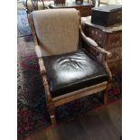 AFTER A DESIGN BY THOMAS HOPE, A 20TH CENTURY FAUX WALNUT OPEN ARMCHAIR With oatmeal fabric