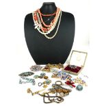 A COLLECTION OF VINTAGE COSTUME JEWELLERY Including three coral necklaces, a yellow metal and