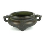 A SMALL CHINESE BRONZE TWIN HANDLE GLOBULAR CENSOR Bearing character mark. (w 14cm x h 5.5cm)