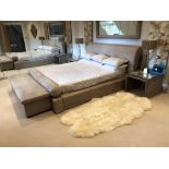 A BEIGE LEATHER BEDROOM SUITE OF FURNITURE To include a Super King bed, headboard, a pair of bedside