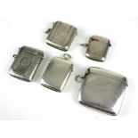 A COLLECTION OF FIVE EARLY 20TH CENTURY SILVER VESTA CASES Including a rectangular case marked '