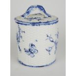 A VICTORIAN PORCELAIN BLUE AND WHITE JAR AND COVER Having embossed floral decoration on basket weave
