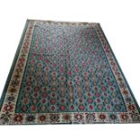 A KELIM RUG OF CARPET PROPORTIONS Traditional design, with central madder field contained within a
