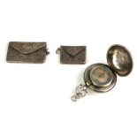 TWO EDWARDIAN SILVER ENVELOPE FORM POSTAGE STAMP HOLDERS With engraved decoration including