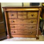 A VICTORIAN MAHOGANY NORTH COUNTRY CHEST With two hat drawers and to short drawers above three