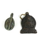 A CHINESE BRONZE BUDDHA PENDANT WALL HANGING In seated pose with shrine, together with a melon
