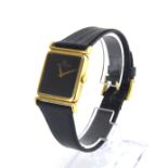 JAEGER-LECOULTRE, AN 18CT GOLD GENT?S WRISTWATCH Having a square black tone dial with gilt hands