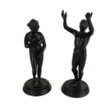 A PAIR OF 19TH CENTURY PATINATED BRONZE FIGURES On a circular base, after the antiques ?The Venus