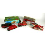 A COLLECTION OF VINTAGE TIN PLATE TOYS Comprising of a Tri-Ang Minic truck, a clockwork pocket toy