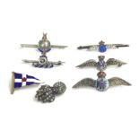 A COLLECTION OF EARLY 20TH CENTURY STERLING SILVER AND ENAMEL MILITARY SWEETHEART BADGES Including