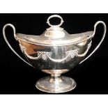 A LARGE VICTORIAN SILVER PLATED OVAL NAVETTE FORM SOUP TUREEN AND COVER With twin handles, applied