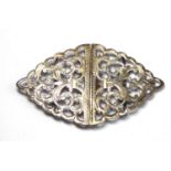 AN EDWARDIAN SILVER NURSE'S BUCKLE Having pierced and scrolled design, hallmarked Birmingham,