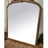 A LARGE 19TH CENTURY GILT FRAMED OVERMANTEL MIRROR The gesso mouldings in the form of acorns