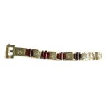 A LATE 19TH/EARLY 20TH CENTURY WHITE METAL AND AMBER BRACELET Having fine engraved decoration and