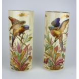 A PAIR OF 20TH CENTURY ?B & CO.? LIMOGES PORCELAIN CYLINDRICAL VASES Parcel gilded and hand