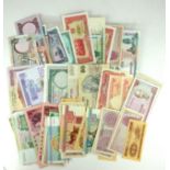 A COLLECTION OF WORLD BANK NOTES Including Bahrain and Jordan one Dinar, Mozambique 100 escudos,