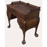 JAMES HICKS OF DUBLIN, A FINE 19TH CENTURY CHIPPENDALE REVIVAL MAHOGANY DESK With pierced fretwork