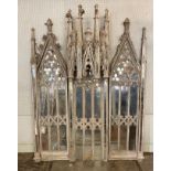 A 19TH CENTURY FRENCH GOTHIC LIMED PINE ALTAR PIECE CONVERTED TO A TRIPTYCH MIRROR Three