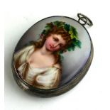 A LARGE WHITE METAL DOUBLE SIDED OVAL LOCKET With enamelled female portrait and Romanesque print
