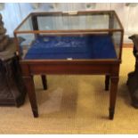 A LATE VICTORIAN MAHOGANY SHOPS JEWELLERY DISPLAY CABINET With glazed top, raised on square tapering