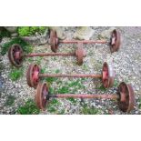 A SET OF FOUR HEAVY STEEL RAILWAY WHEELS. (l 110cm)