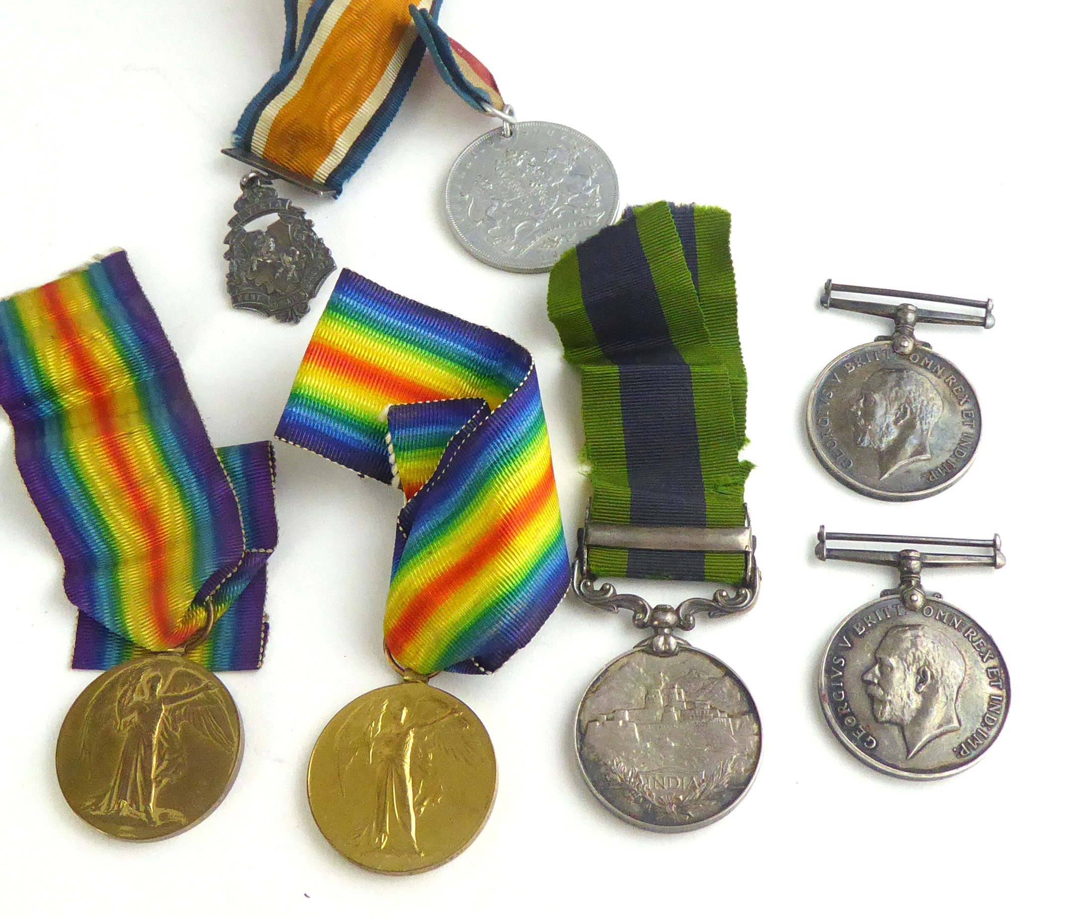 A GEORGE V SILVER INDIA GENERAL SERVICE MEDAL GROUP Comprising an India medal with Afghanistan NWF