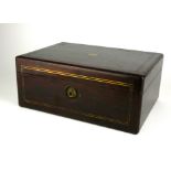 A VICTORIAN ROSEWOOD AND BRASS JEWELLERY BOX Having brass stringing and two velvet lined pull out