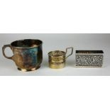 AN EARLY 20TH CENTURY SILVER CHRISTENING MUG Having a single handle and flutes to the body, together