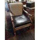 AFTER A DESIGN BY THOMAS HOPE, A 20TH CENTURY FAUX WALNUT OPEN ARMCHAIR With oatmeal fabric