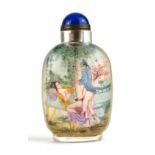 A CHINESE EROTIC REVERSE PAINTED FROSTED GLASS AND LAPIS LAZULI SNUFF BOTTLE Having a cabochon cut