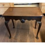 AN 18TH/19TH CENTURY IRISH SILVER TABLE With dished rectangular top above a shaped apron centred