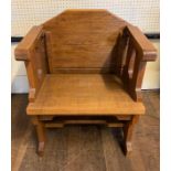 A COTSWOLD SCHOOL OAK MONK'S CHAIR/TABLE. (68cm x 40cm x 90cm)