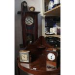 A COLLECTION OF EARLY 20TH CENTURY CLOCKS Comprising a Vienna Wall clock, a Garrard eight day mantle