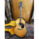EPIPHONE, A CASED VINTAGE ACCOUSTIC GUITAR Having mother of pearl sections to fret, bearing a
