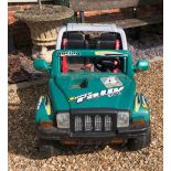 A CHILD?S TWO SEAT ELECTRIC JEEP With charger. (124cm x 80cm x 80cm)