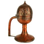 A PERSIAN COPPER INSENSE BURNER Having a dome form hinged lid with fine scrolled and pierced lid. (