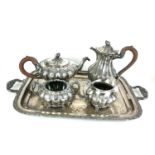 A LATE 19TH CENTURY ?ROGERS OF CANADA? FOUR PIECE SILVER PLATED TEA AND COFFEE SERVICE ON A SILVER
