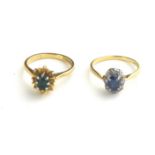 TWO 18CT GOLD DIAMOND AND GEM SET RINGS Oval cut sapphire edged with diamonds and a similar