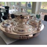 AN IMPRESSIVE SILVER PLATE TABLE CENTREPIECE With central bowl, four fitted tureens and covers,