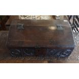 A 17TH CENTURY OAK BIBLE BOX With iron hinges chip carved and bearing initials ?RC 96?, enclosing