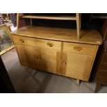 A VINTAGE ERCOL ASH AND ELM SIDEBOARD, with one long and one short drawer